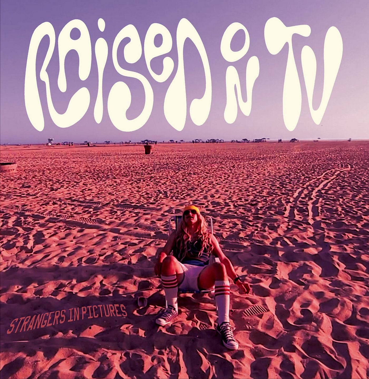 Raised On Tv - Strangers In Pictures (LP)